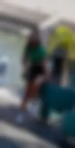 Petite woman in short miniskirt, pretty cheeks and beautiful face [oc]