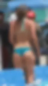 Bunch of sexy babes at the beach in bikinis