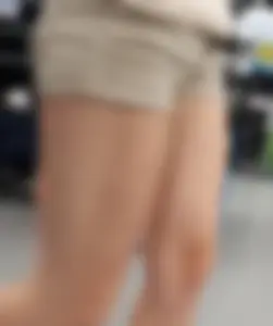 Redhead hottie in shorts shopping with a nice ass