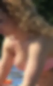 Tattood blonde with a friend in bikinis shows her puffy nipple