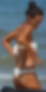 Hot girl at the beach with a nice ass in a white bikini