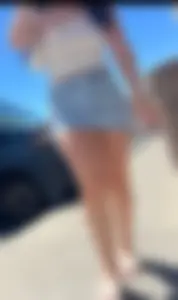 Sexy white girl in mini skirt beautiful legs