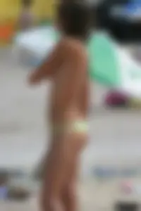 Beach voyeur girls in bikinis, thongs and topless