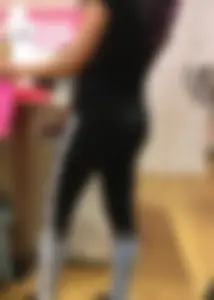 Mature sexy lady in Pink leggings shopping at Pink