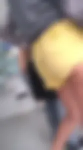 Skinny ass eating her yellow shorts