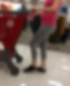 Blonde milf at Target in grey striped leggings with a nice ass
