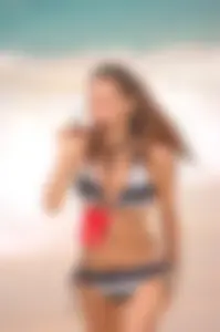Bunch of sexy girls and milfs in bikinis at the beach