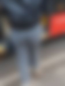 Girl in tight jeans getting on the bus, closeup of her ass
