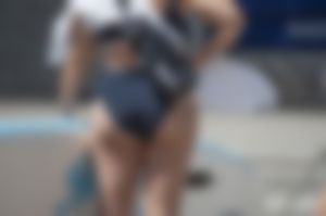 Great ass on bikini bottomed surfer girl