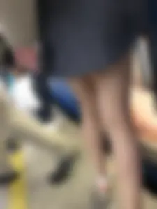 Very hot candid girl sitting in a subway train, closeups of her legs