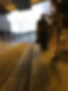 Cute Teen in Shorts on the Tram Stop