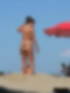 2 topless thonged sexy friends on the beach with great bodies