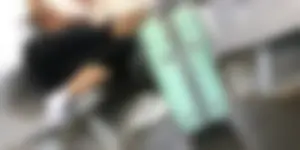 Hot Girlfriend in Pants And White, Slightly Dirty Socks, Her Sneakers Taken Off, Chilling on the Train Seat With Her Head on Her Boyfriend's Lap