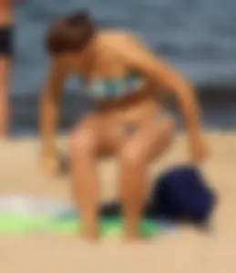 Blue floral bikini babe on the beach