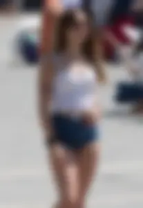 Sexy girl showing her cheeks in tight and tiny denim shorts