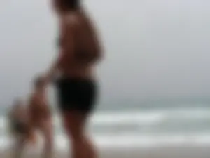 Hot topless girl on the beach in a thong bikini with a nice ass