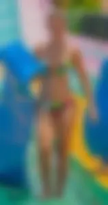 Blonde milf with a great bikini body at a water slide