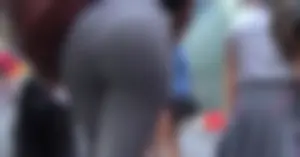 A sexy black ass walking in NYC in tight grey dress pants
