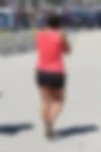 Thick girl in pink top and black shorts with vpl