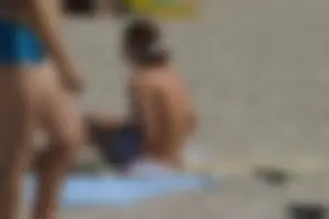 Beach voyeur girls in bikinis, thongs and topless