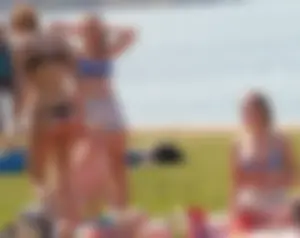 Teen in her underwear at a beach park with a nice ass in thong
