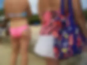 Sexy friends on vacation in pink and black bikinis with decent asses