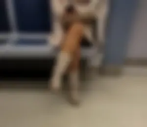 Milf’s legs in boots and pantyhose subway train creepshots