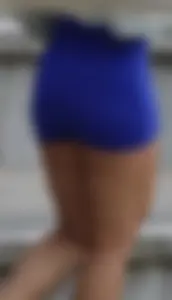 Mixed race woman in spandex shorts outfit
