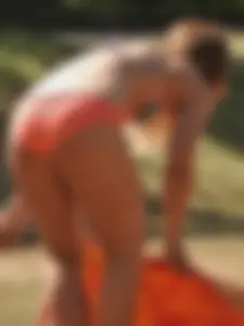 She looks good in both a dress and a bikini [033]