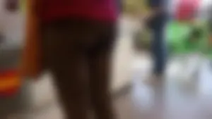 Nice ass checking out in leggings at a grocery store