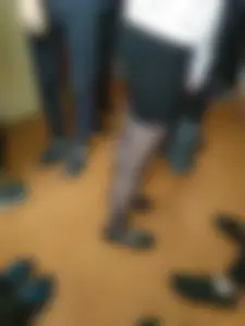 College girls' legs in black pantyhose closeups