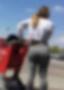 Sexy lady shopping at Target with a big ass in grey leggings