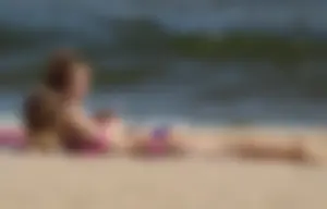 Two sexy beach teens in bikinis, one thick and one skinny with big boobs