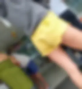 Skinny ass eating her yellow shorts