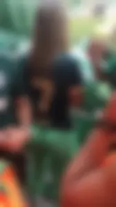 Sexy Butt in Green Tight Yoga Pants - Female Sports Fan at the Stadium Closeup Creepshot