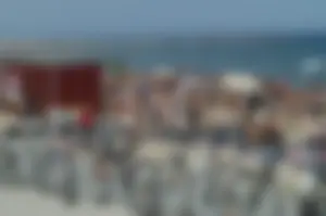Topless girls on a beach in Barcelona