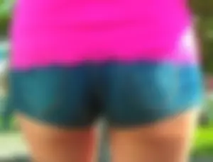 Skinny babe in denim shorts with a nice gap showing ass cheeks
