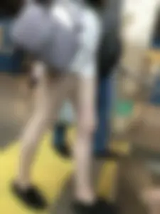 Subway train and subway station creepshots of a candid girl wearing shorts with pale skinny legs