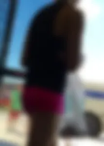 Sexy girl with a nice ass in tight pink spandex shorts