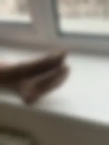 Feet in Pantyhose Closeup of a Teen Girl Siting on the Windowsill