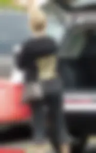 Juicy blonde booty in black leggings