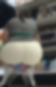 Amazing Asian in white yoga shorts upshot bends squat at Target