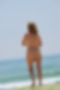 Sexy mature nude beach milf showing it all