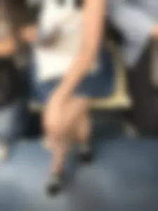 Candid Subway Girl in a Denim Skirt - Standing on Platform And Sitting in the Train With Crossed Legs Touching Her Knee