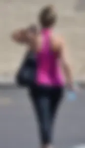Skinny blonde in grey leggings with a friend