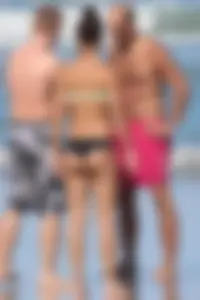Beach girl out in a bikini with a nice round big booty