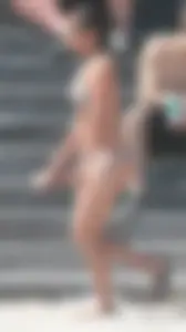 Bunch of sexy babes at the beach in bikinis