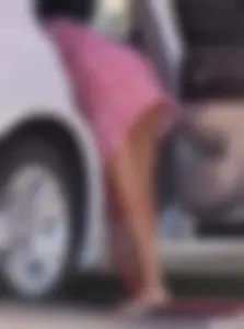 Sexy blonde upskirted in pink dress while cleaning her car