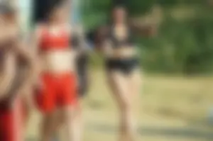 Group of Girls in Swimsuits Walking on the Beach Candid Photo Gallery