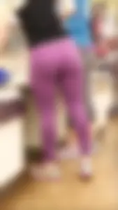 Thick Blonde in purple leggings